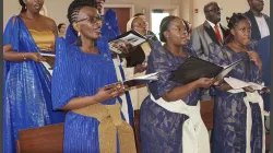 Bridget Nadunga Gidudu, second from the left, sings with other members of the Uganda Catholic Community of Michigan at Christ the King in Ann Arbor in 2024. (photo: Courtesy photo / Christ the King)